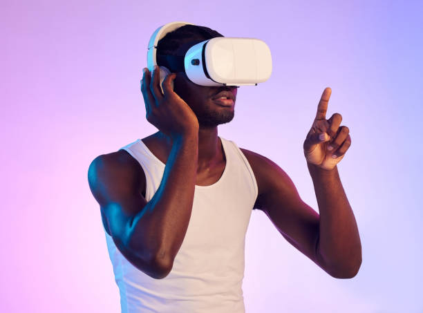 istock Virtual reality, headphones and black man press on screen, future technology and holographic on purple background. 3D, high tech and VR, metaverse and digital world in studio with cyber and audio 1738897553
