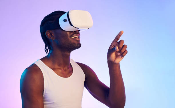 istock Virtual reality, digital world and black man press on screen, future technology and holographic on gradient background. UX, 3D and high tech with VR, metaverse and scifi in studio with cyber space 1738897554