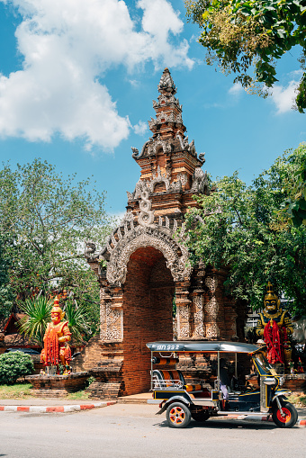 Chiang Mai, Thailand - September 24, 2023 : Wat Lok Molee temple and tuktuk local taxi