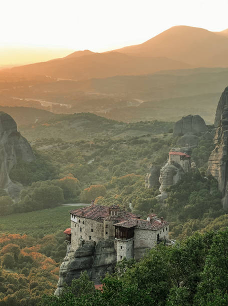 istock sunset over beautiful monastery built on a cliff in Meteora 1738914908