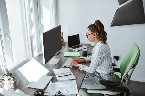 istock Female Financial Manager Doing Desk Work In Office 1738915459