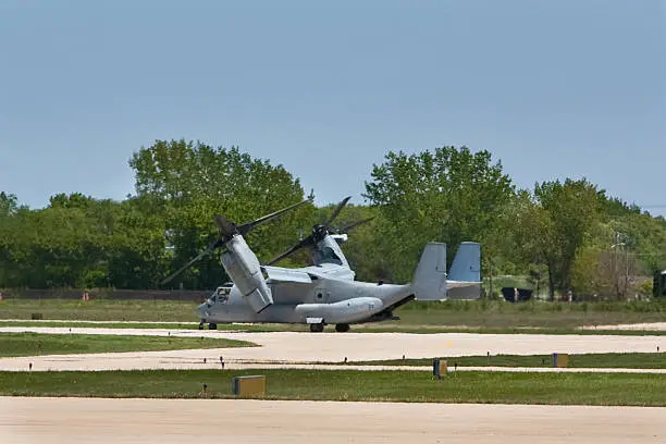 a US Marine corp V22 turbo tilt prop aircraft prepares for a horizontal take off