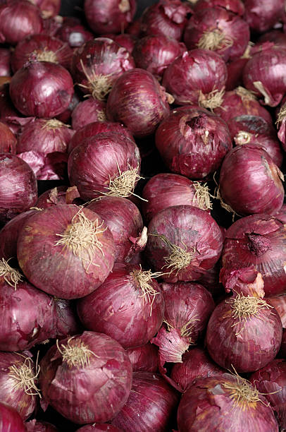 istock red onions on display in a produce market 173892393