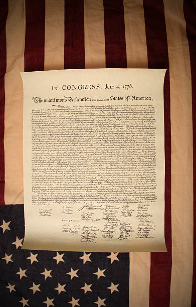 istock Declaration of Independence and American flag 173892539