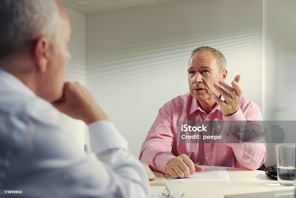 senior uomini d'affari in riunione - Foto stock royalty-free di 70-79 anni