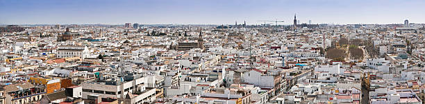 istock Seville rooftops landmarks cityscape panorama 173893004