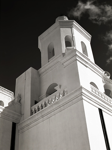 Black and while Film Image of Spanish mission San Xavier del Bac started in 1692 by Spanish missionaries in the Americas