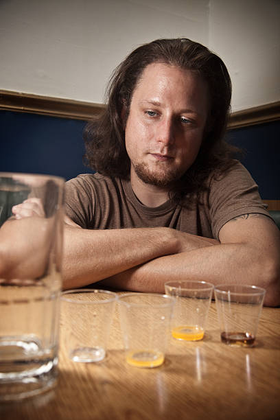 Man sitting in a restaurant or bar stock photo