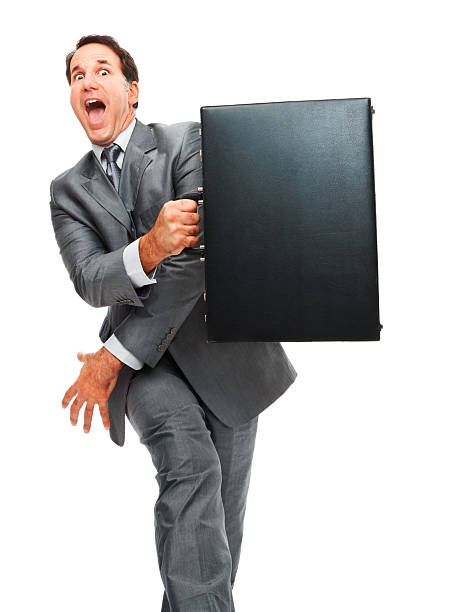 istock Excited mature businessman holding briefcase 173893523