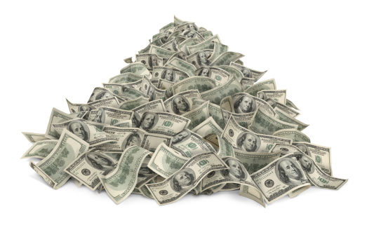 Heap of money (one hundred-dollar bills) isolated on white background.