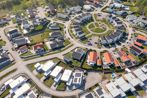 Streets and houses in a modern residential area viewed from above in Strängnäs, Sweden.