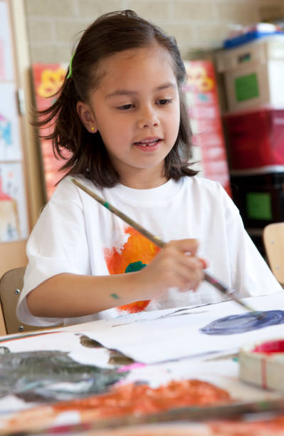 istock Little child painting 173894537
