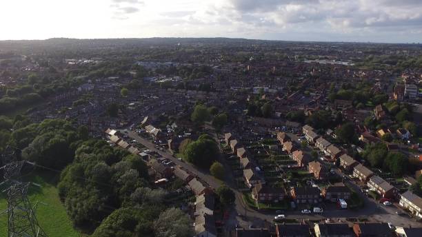 istock a city with green grass and trees is shown from above 1738947633