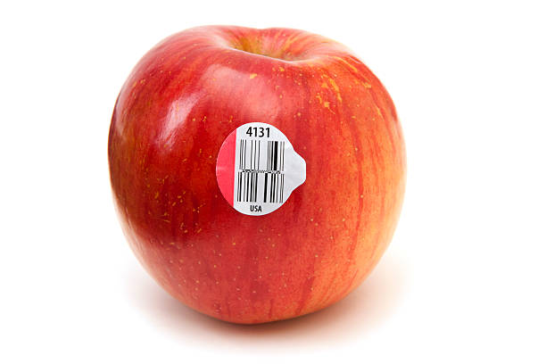 New GS1 DataBars (Bar Codes) on an Apple "GS1 DataBars, can store more data than traditional bar codes. The first use of this new technology is on loose produce at supermarkets. GS1 DataBars aid in food safety, product tracing, and product recalls, they can include product and manufacturer identification information. Food recalls are made easier when GS! DataBars are used." traceability stock pictures, royalty-free photos & images