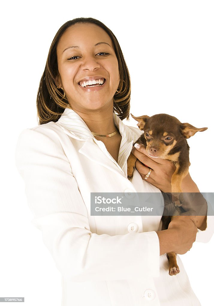 Afro-americana Mulher de negócios segurando Cachorro - Foto de stock de Jovem Adulto royalty-free