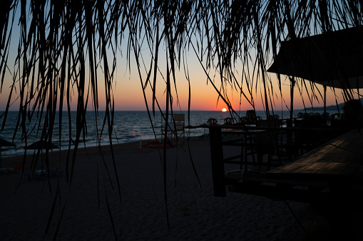 Sunset over Ionian sea and beach