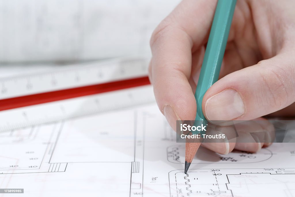 Palm with a pencil  Business Stock Photo