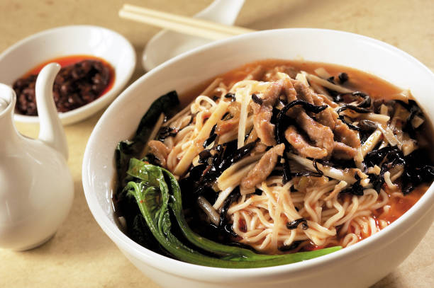 istock Asian cuisine Sichuan noodle on a table 1738961105