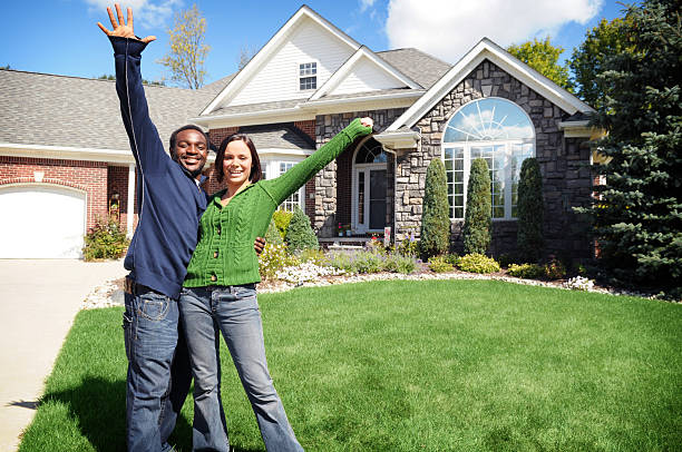 istock Young Couple with New Home 173896156