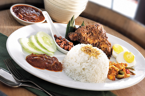 Asian food nasi lemak with chicken rendang