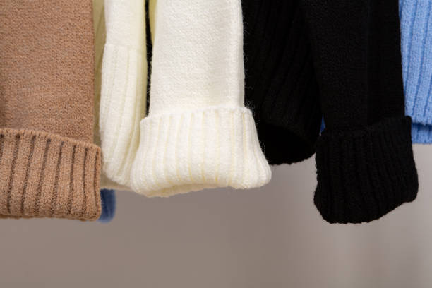 istock Sleeves of knitted wool sweaters close-up 1738963528