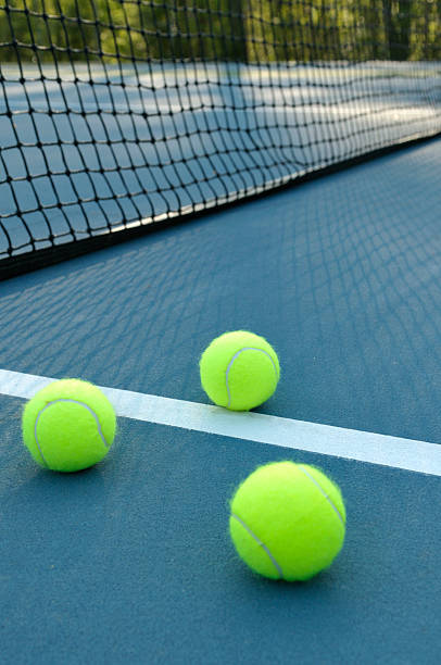 istock Three Tennis Balls on Court 173896389