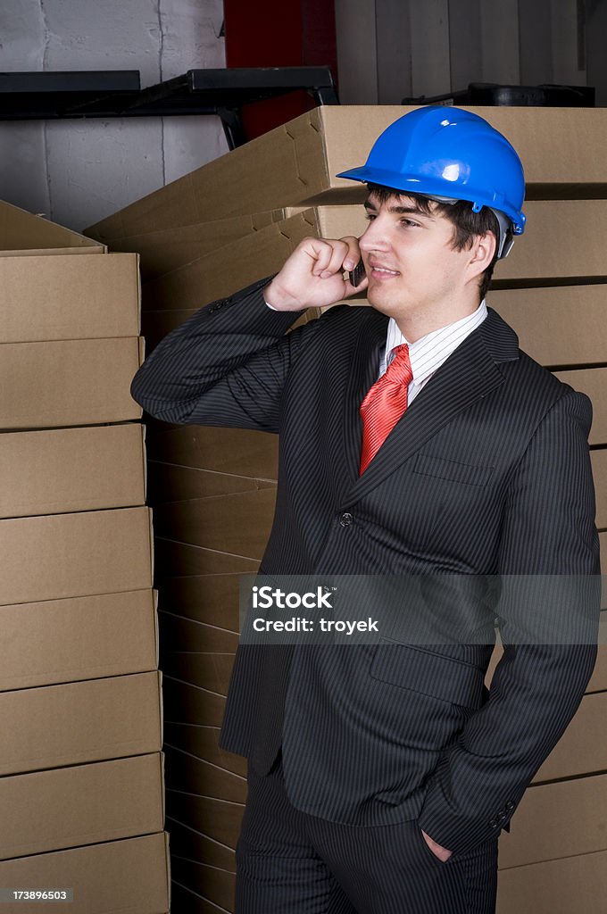 Engineer in warehouse Adult Stock Photo