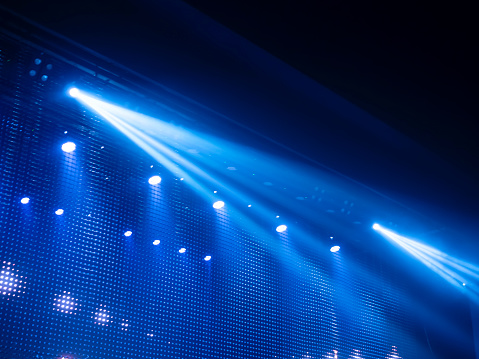 spotlights or light beams on-stage performance, concert, shining directly from left to right-hand side. for backdrop or background.