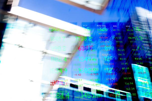 istock Finance.  Fintech. Abstract Office Buildings and Trading Screen Data. 1738969757