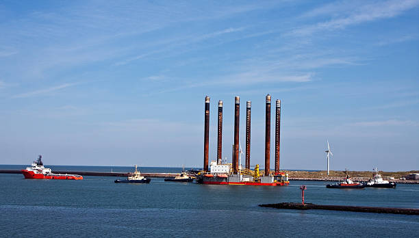 istock Lifting platform being towed to sea 173897813