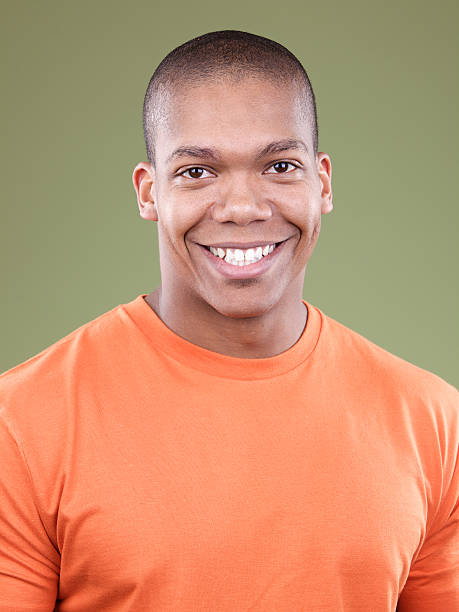 istock Attractive young male smiling at camera 173898067