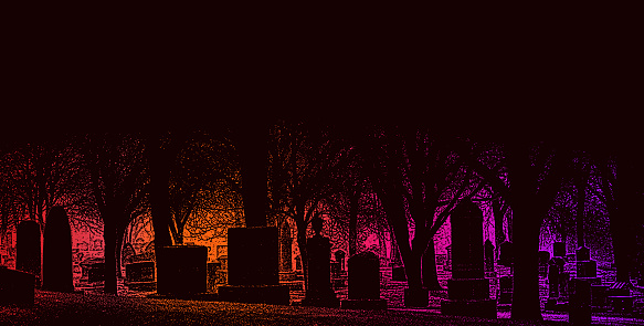 Spooky cemetery at night