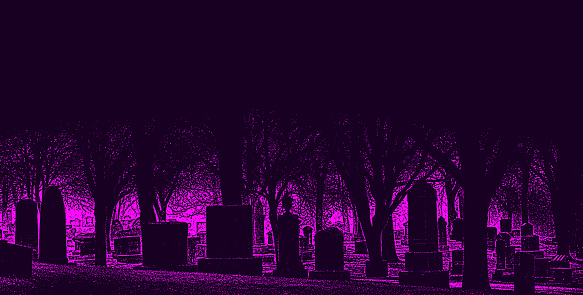 Spooky cemetery at night