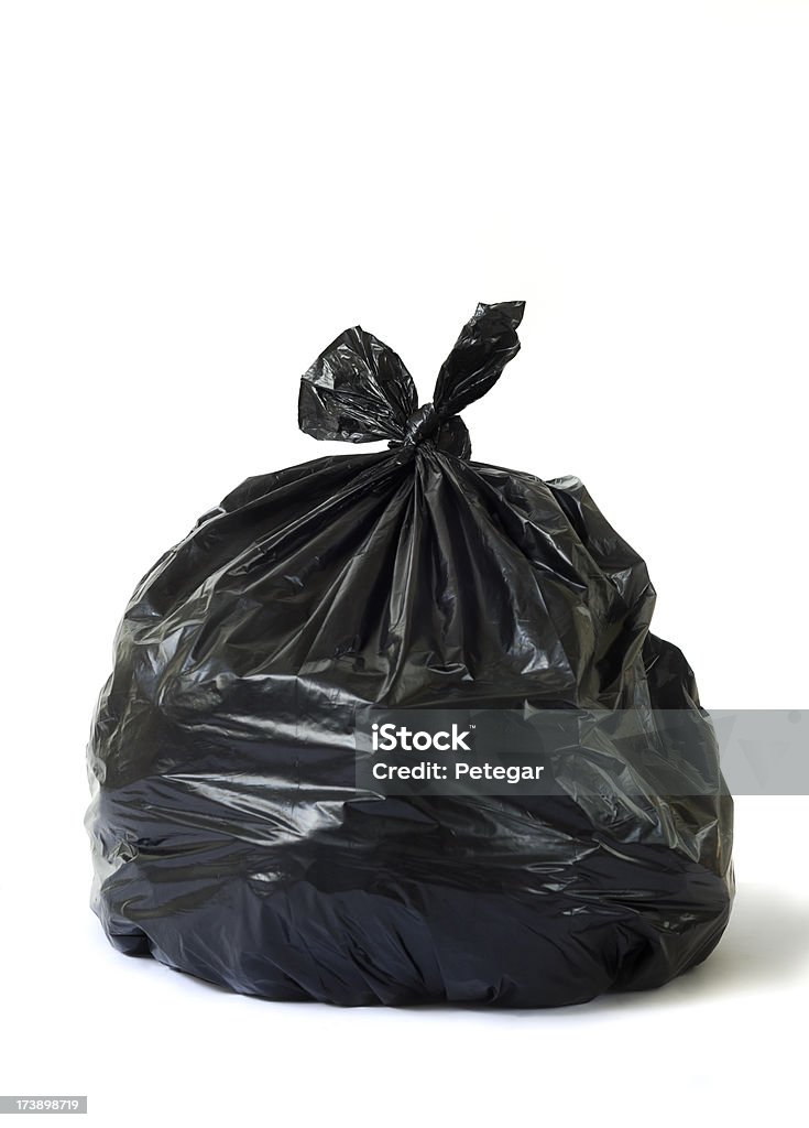 Poner verde bolsa - Foto de stock de Bolsa de la basura libre de derechos
