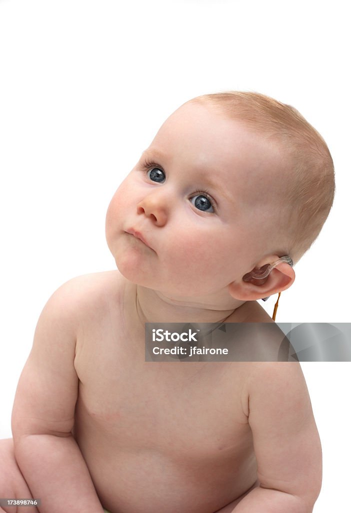 Милый ребенок девочка с Слуховой аппарат - Стоковые фото Младенец роялти-фри