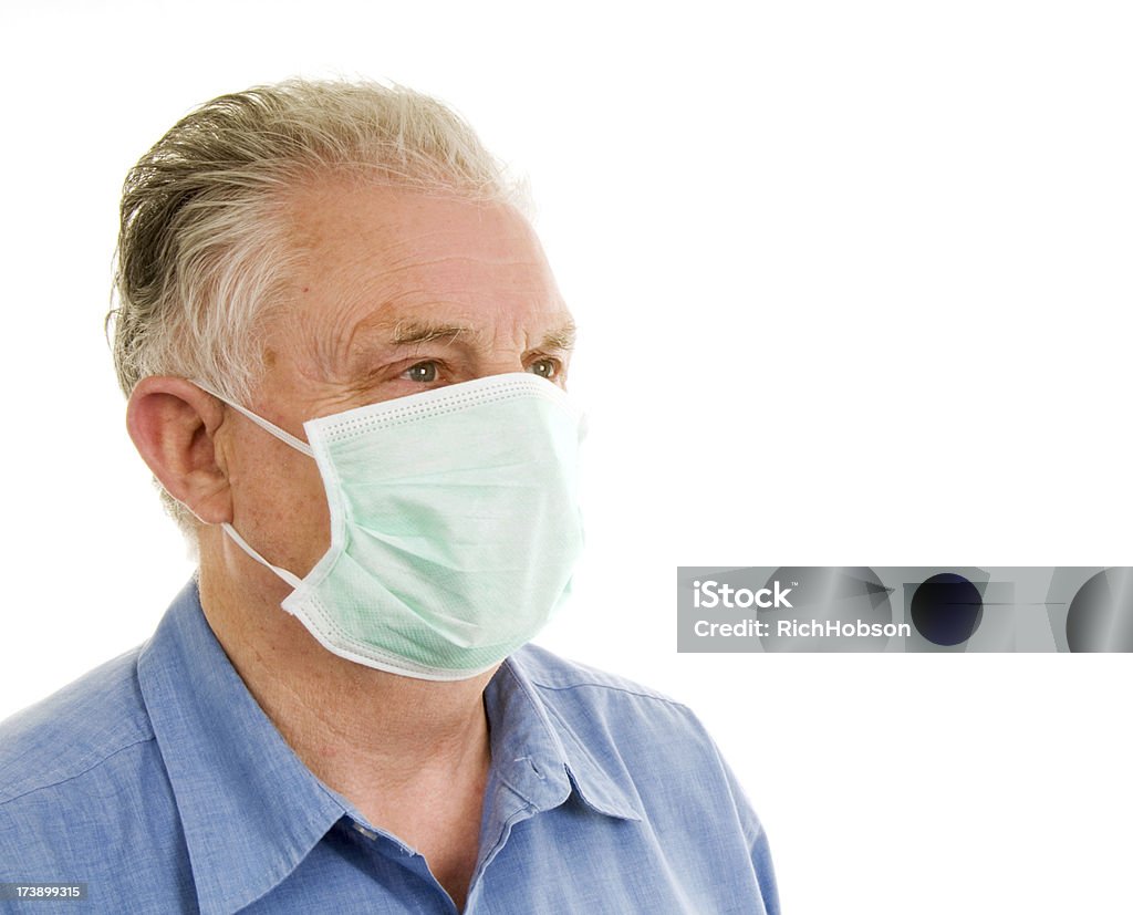 Senior Male with Face Mask Senior Male wears face mask to prevent infection and spread of bacteria and virus. 70-79 Years Stock Photo