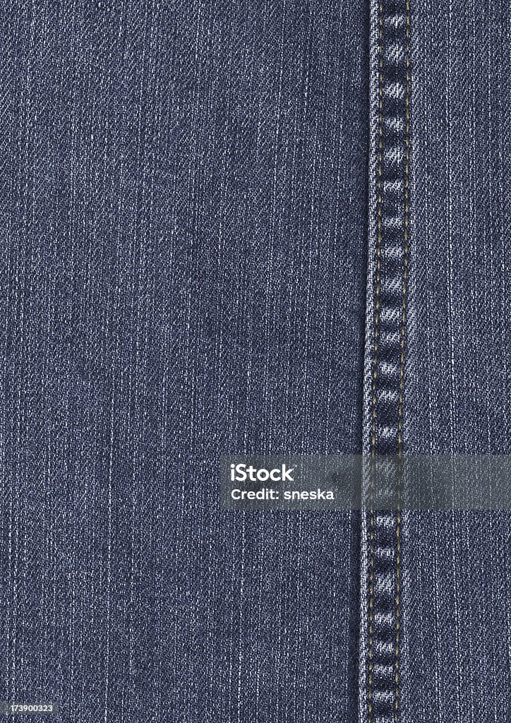 denim texture with seam denim texture with seam visible Backgrounds Stock Photo