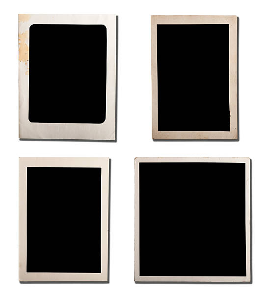 istock Old blank photos isolated on white 173900635