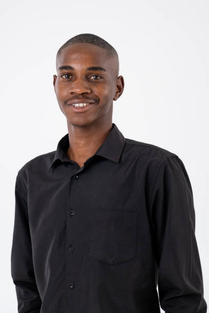 istock Black man in formal clothes smiling 1739010464
