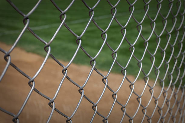 istock Baseball Field chain link fence (XXXLarge) 173901241