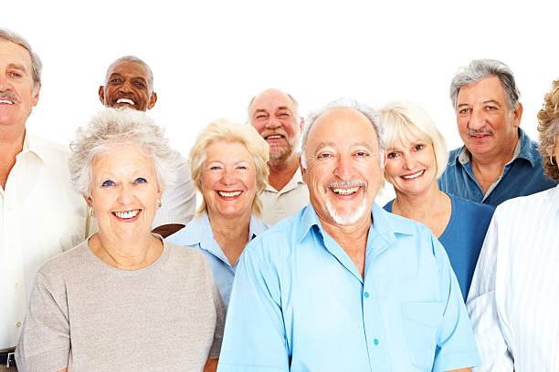 istock Group of smiling senior men and women over a white backdrop 173901443