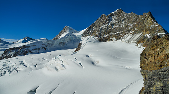 View for Morteratsch Glacier and panorama of Piz Berinia and Piz Palu in Switzerland. Swiss Alps.