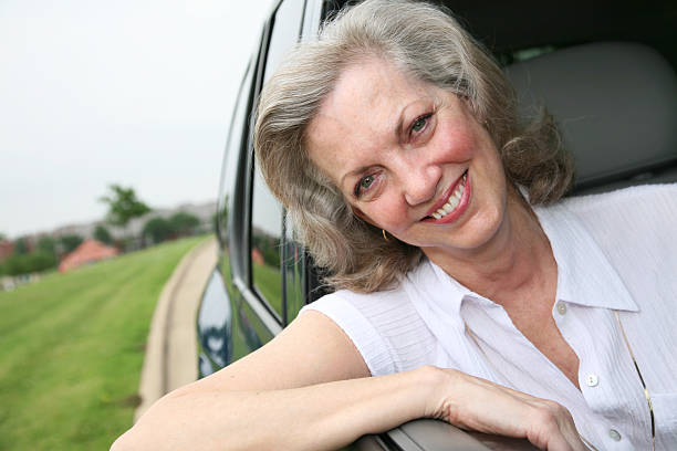 istock Smiling Woman Enjoying A Car Ride 173901894