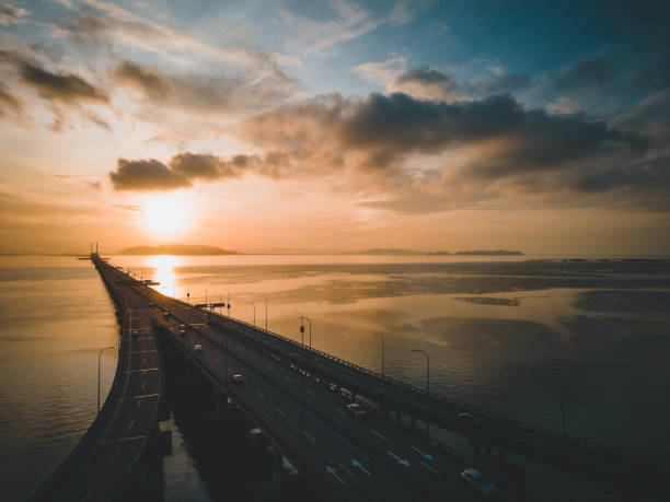istock Penang bridge architecture aerial top down view during sunrise. 1739020076