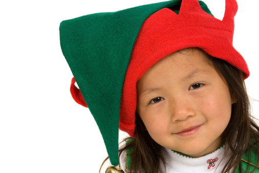 Closeup of Chinese cutie wearing elf/Christmas hat