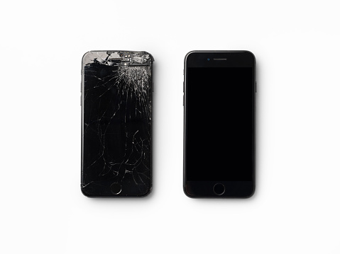 broken smartphone isolated on white background