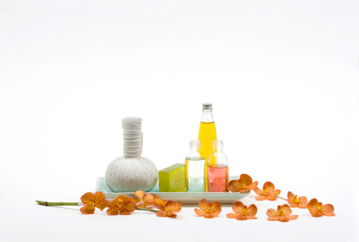 Herbal Compress On A Ceramic Plate With Massage Oil & Orchid Flowers. Please visit my private lightbox by clicking on the image below to see more of my photos Within this category: