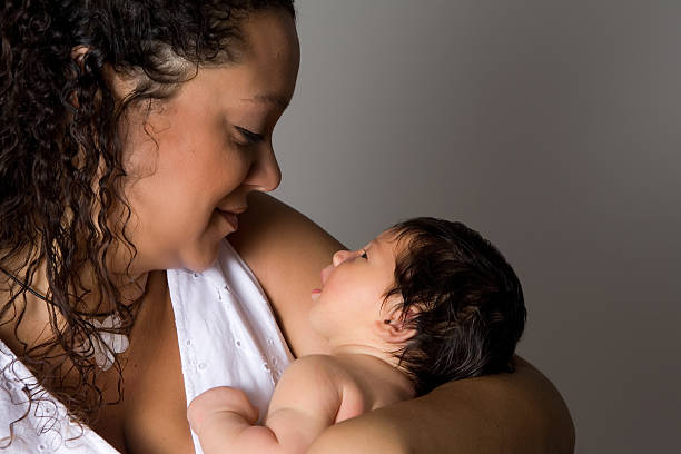 istock Mother and Newborn Gazing 173903501