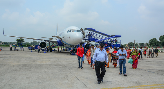 Jammu, India - Jul 24, 2015. Passenger airplane docking at Jammu Airport, India. It is situated 14 km from the international border between India and Pakistan.