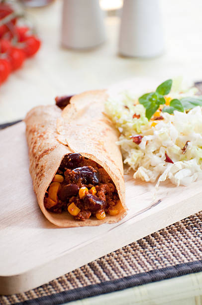 istock delicious burrito with salad 173903778